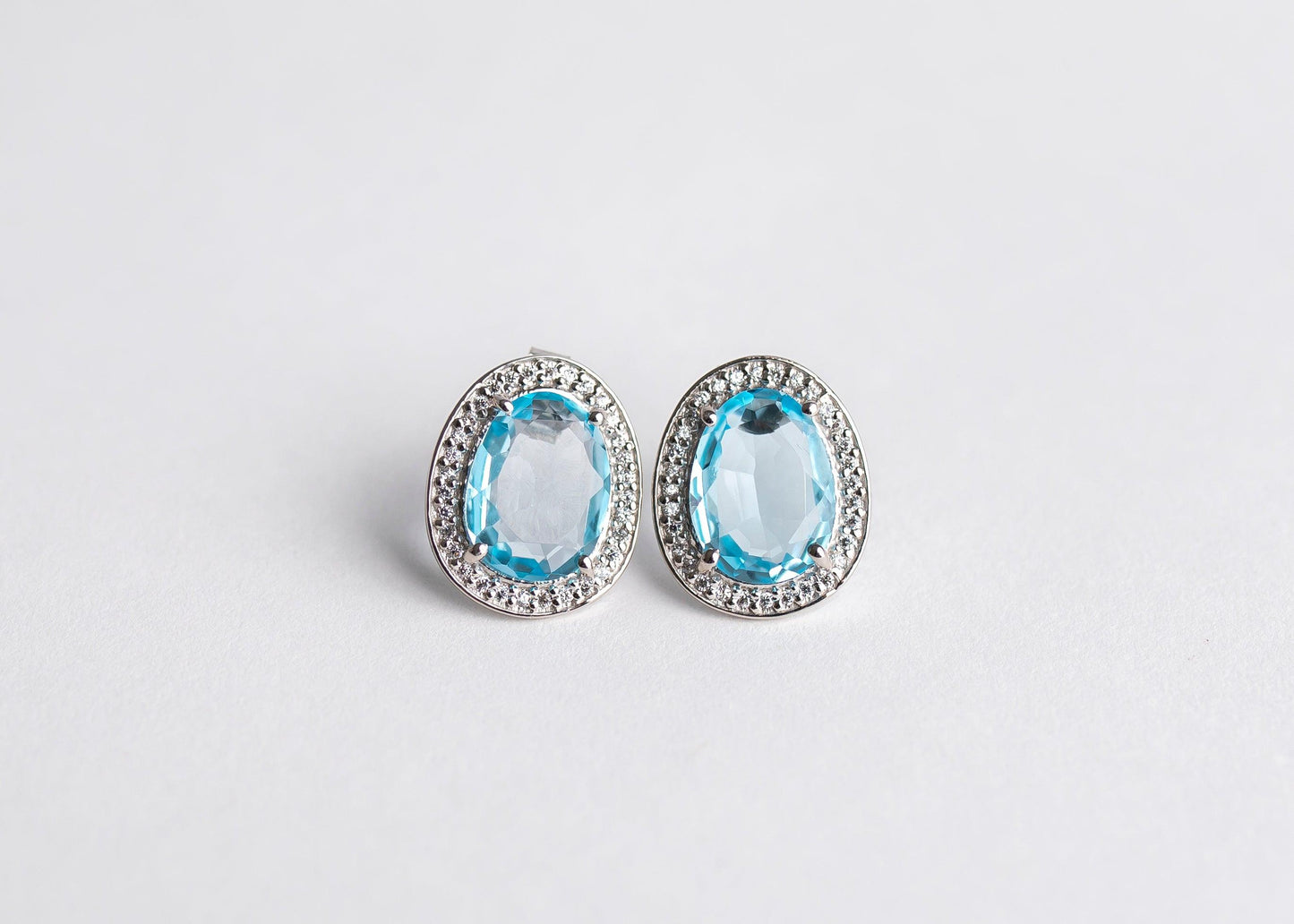 Sky Blue Topaz Studs minimal everyday fine jewelry in solid gold and sterling 925 silver with natural gemstones.