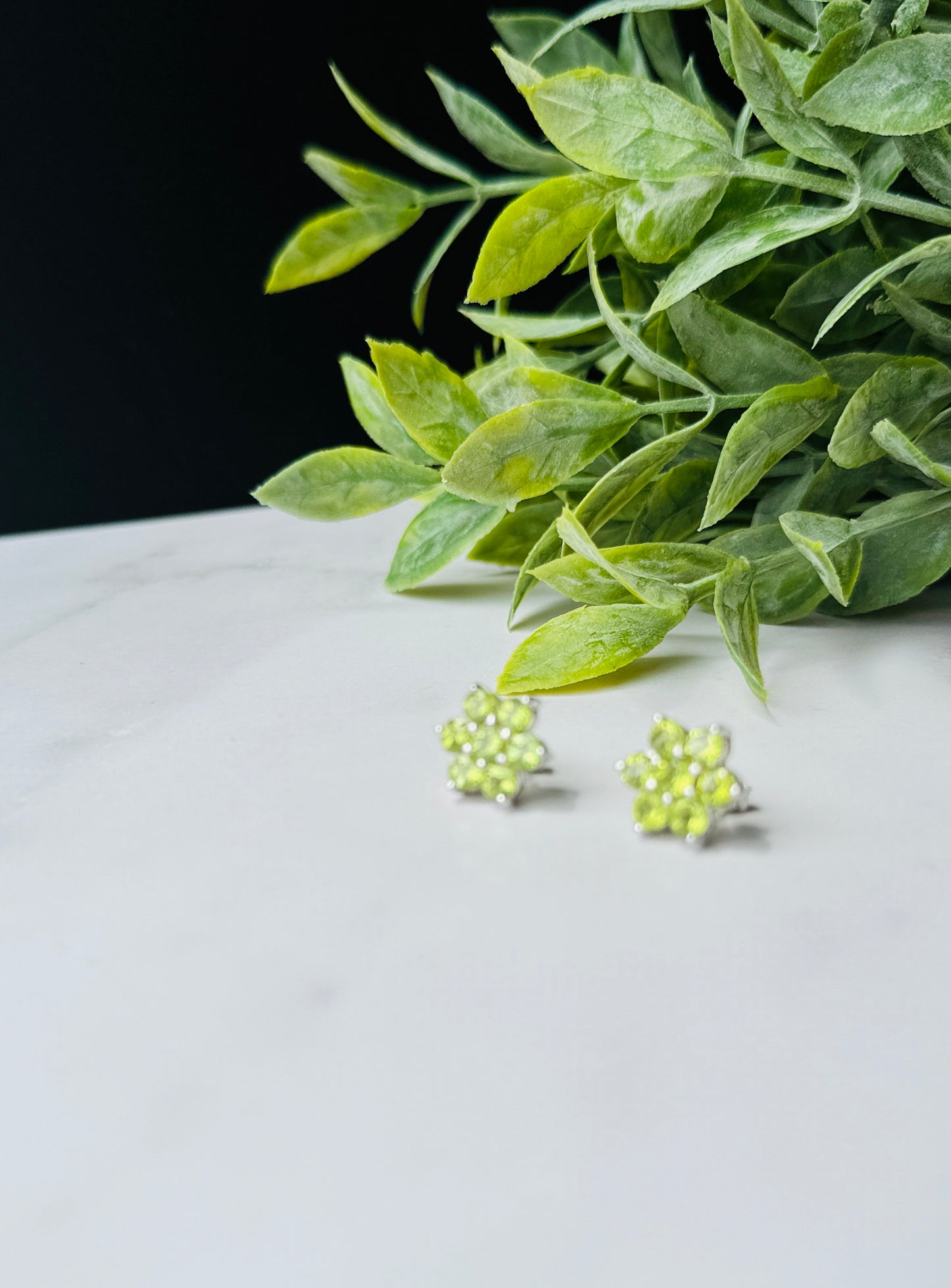 Peridot flower design in silver