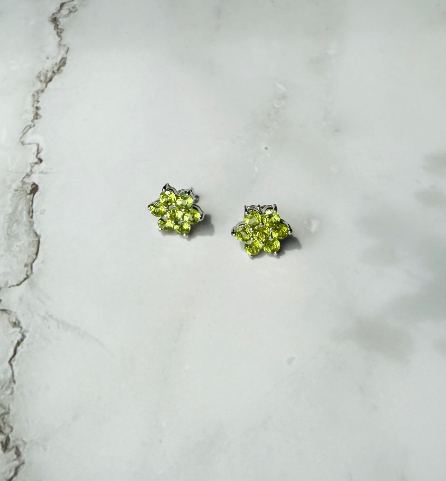 Peridot flower design in silver