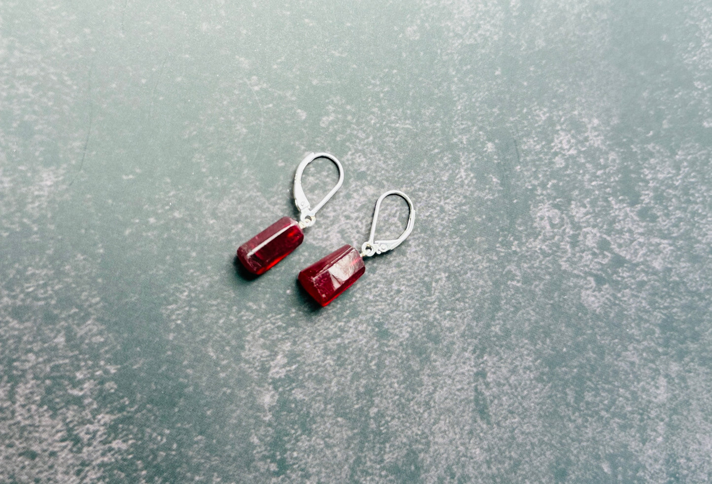 Glass filled ruby drops