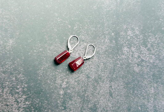 Glass filled ruby drops