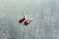 Glass filled ruby drops